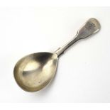 A William IV silver fiddle pattern caddy spoon, maker (?)WC, London 1842, l.