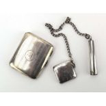 An early 20th century silver cigarette case and matching vesta, Chester 1912,