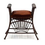 A late 19th/early 20th century carved and bentwood oak stool with rope and barley twist supports,