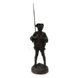 A 1972 Soviet Russian cast-metal figure modelled as a boy fisherman,