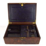 A 19th century leather bound writing/stationary box, the fitted interior with detachable trays,