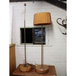 2 teak and brass floor lamps, 1 with ruffled orange shade