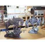 Pair of bronze effect statues by Buck McCain