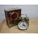 Brass cased Hettich West German mantle clock and small alarm clock