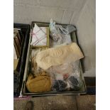 Crate of various linen, ribbon and other materials