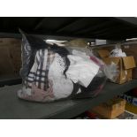 Bag of assorted mens and womens clothing