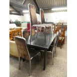 Black painted dining table with set of 8 chrome framed dining chairs