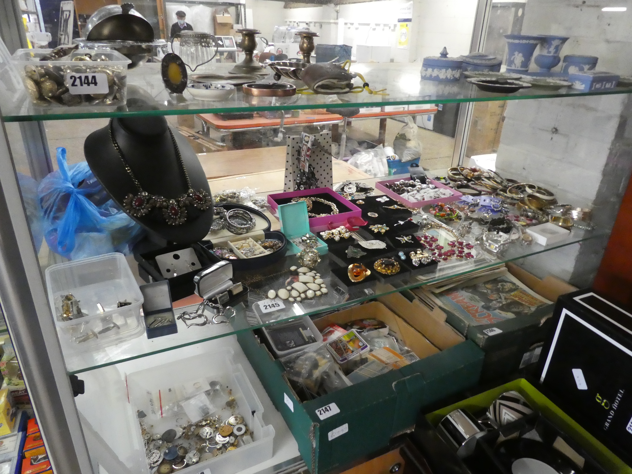 Shelf of assorted dress jewellery, watches, cufflinks, etc.