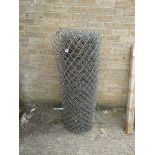 (1071) Large roll of corrugated metal fencing