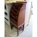 Mahogany magazine/ letter rack raised on square supports