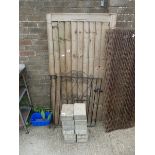 5' wooden gate with smaller metal gate and 12 concrete pavers