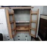 (7) Cream double door larder unit with wooden fitted interior, 3 drawers and oak top