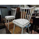 Pair of white painted spindle back chairs