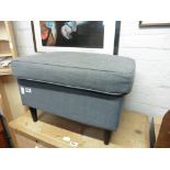 Grey upholstered footstool