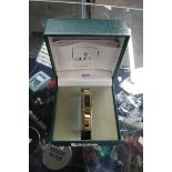 Gucci 1500 Petite black faced cocktail watch with box and warranty card dated December 1995