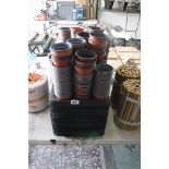 Large quantity of plastic plant trays and plant pots