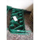 20 shorter lengths of green powder coated metal edging