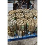 6 rolls of pressure treated log roll edging