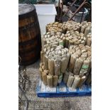 6 rolls of pressure treated log roll edging