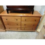 Stained pine wide chest of 6 drawers