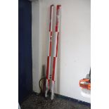 2 sets of surveying staves