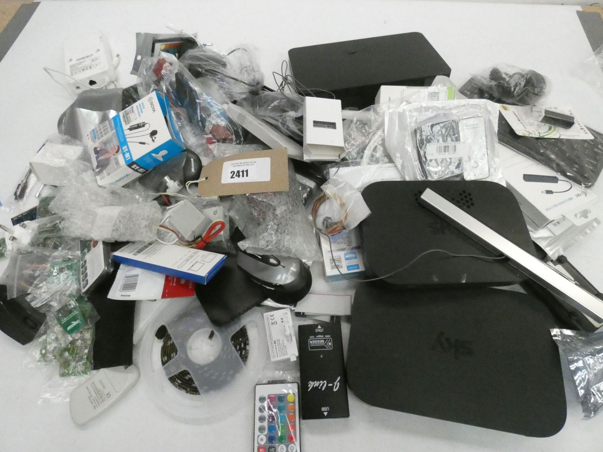 Bag containing quantity of electrical related accessories/devices; routers, adapters, mice, LED