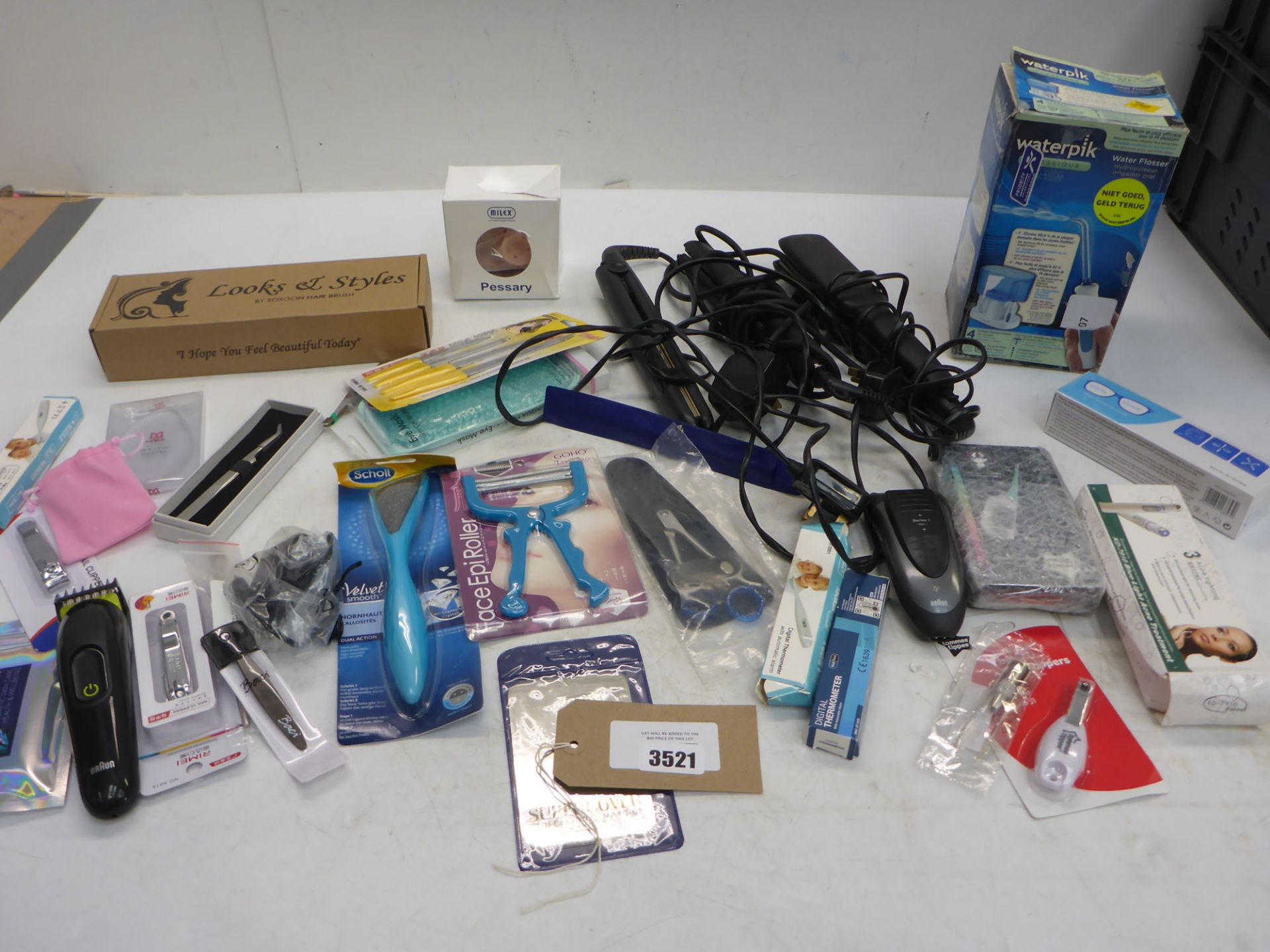 Waterpik Classique, hair straighteners (af), nail clippers, files, tweezers, digital thermometers,