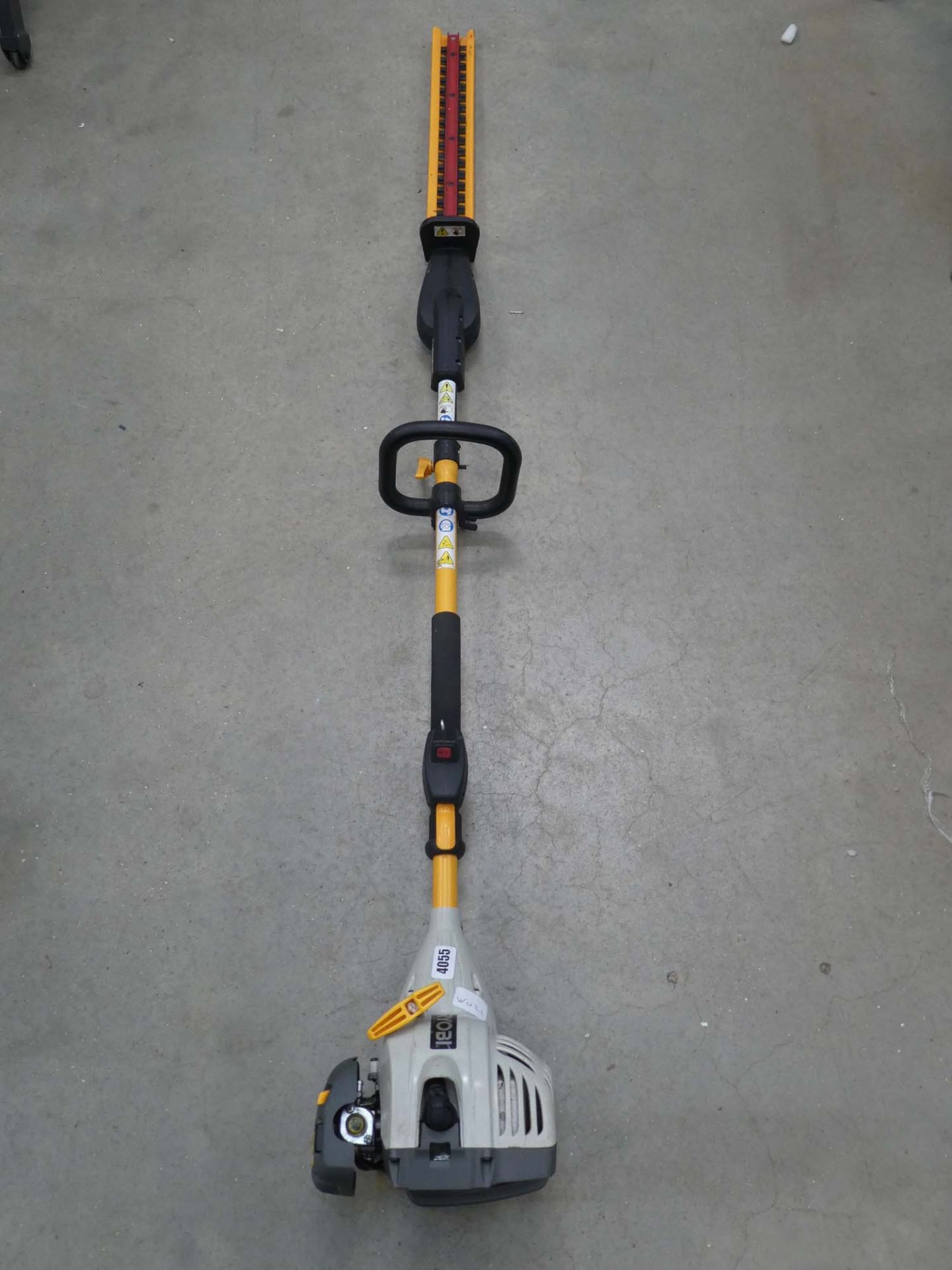 Ryobi petrol powered long reach hedge cutter