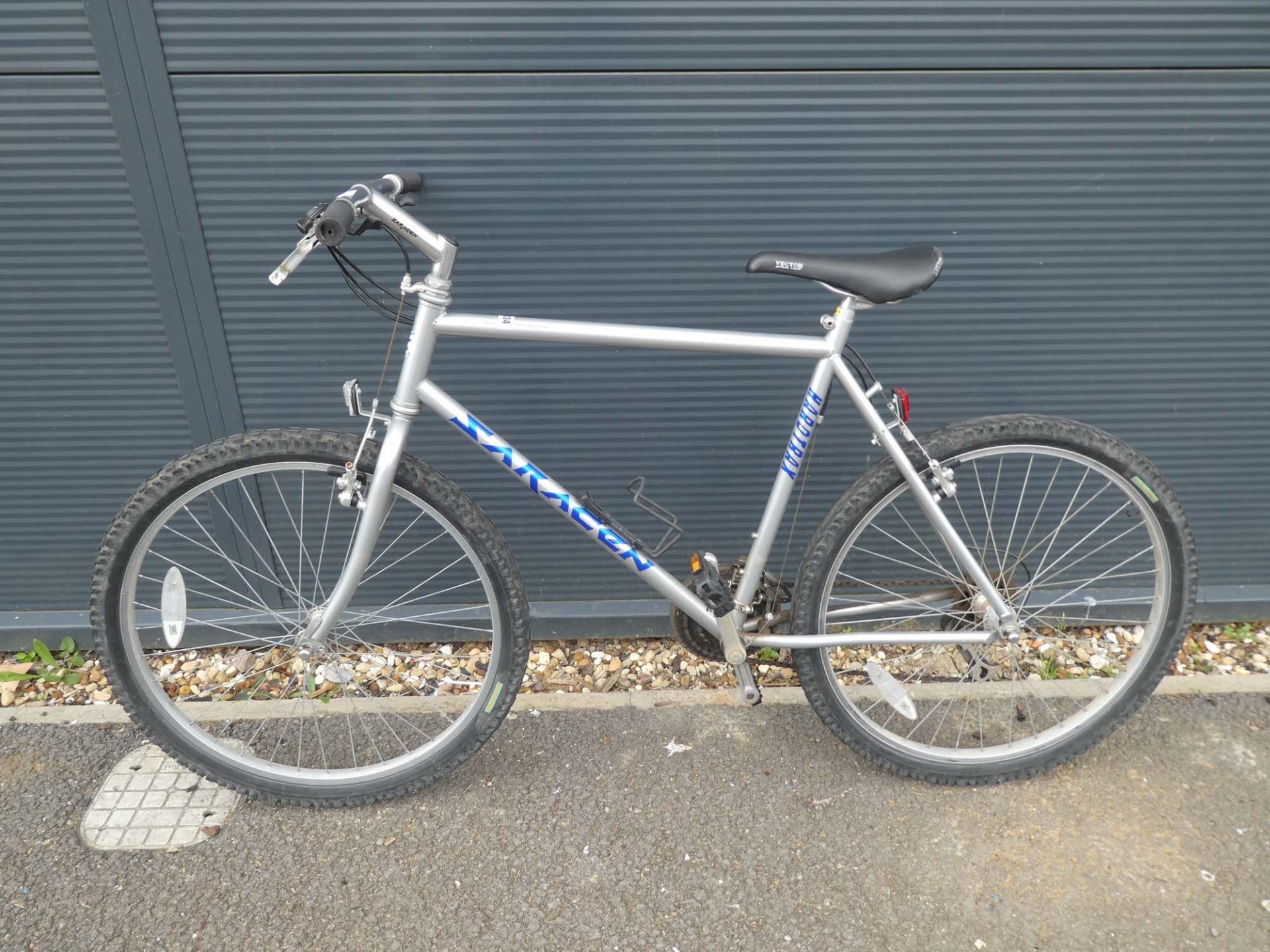 Silver and blue Saracen mountain bike