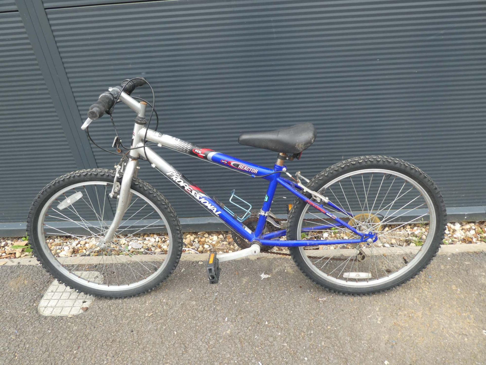 Blue and silver child's mountain bike