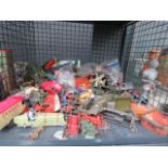 5529 cage containing die cast cars, canons and other toys