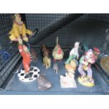 Cage containing quantity of ornamental animal and clown figures