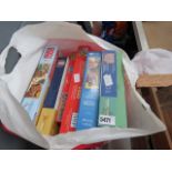 bag containing quantity of jigsaw puzzles