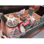 Box containing quantity of resin figures inc. farmer on tractor, fox, falcon and novelty teapot