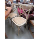 Pair of ash dining chairs with wicker seats