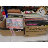 2 boxes containing vinyl records