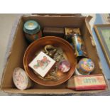 Box containing horse brasses, commemorative and other tins