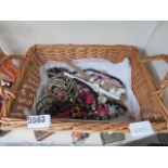 Basket with quantity of costume jewellery and wrist watches