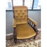 Edwardian button back armchair with exposed carved frame