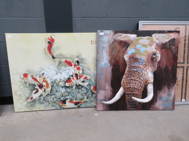 2 modern wall hangings of a goldfish and an African elephant