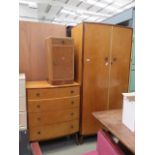 Birds eye maple 1950s bedroom suite comprising double wardrobe, chest of 4 drawers and a pot
