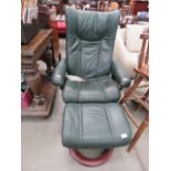 Green leather effect stressless reclining and revolving armchair with matching footstool