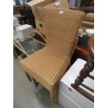 Pair of modern wicker dining chairs