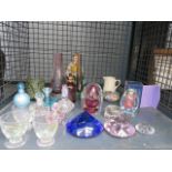 Cage containing paperweights, ornamental figures and glasses