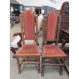 Pair of high backed upholstered chairs