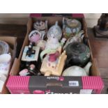 Box containing novelty and other teapots