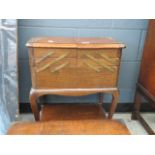 Oak cantilever sewing box with a quantity of buttons, thread and ribbons