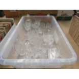 2 boxes containing wine glasses, sherry glasses and dishes