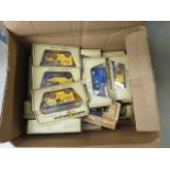 2 boxes containing Lledo, Matchbox models of yesteryear and other die cast cars