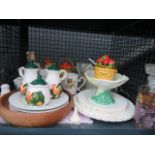 Cage containing Capo Di Monte style figure, jam and marmalade jars, chicken patterned crockery and